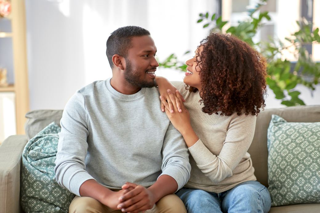 Happy African American Couple Talking at Home